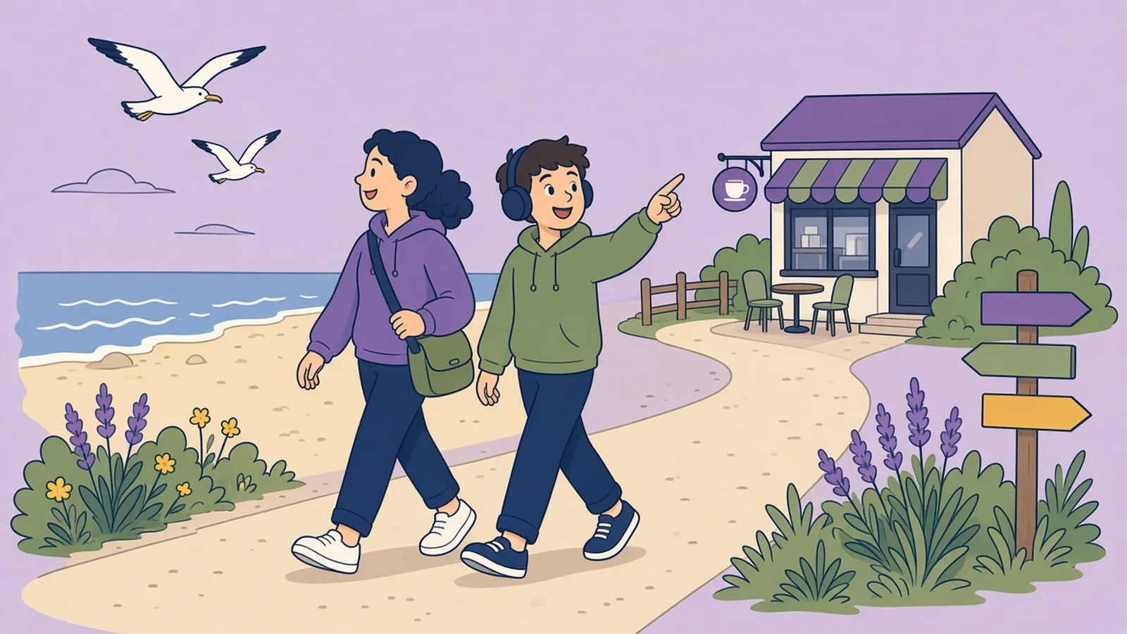 A support worker and a young man in headphones walking along a beach path towards a café.